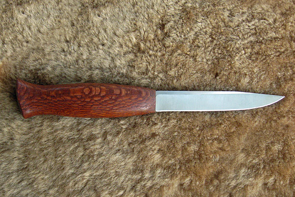 File steel blade, hand carved Lacewood grip.